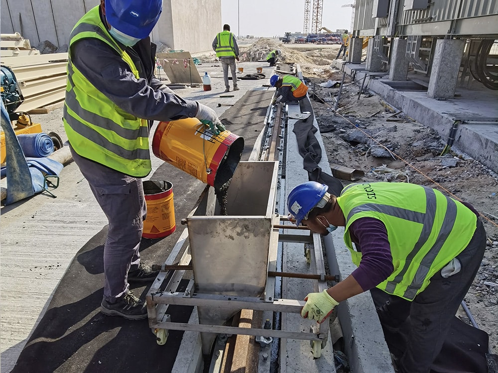 gantry crane rail grout sole plate installation shipyard