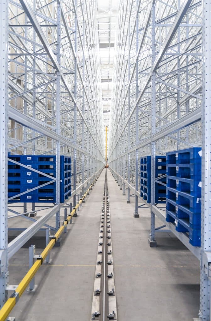 Automated warehouse rail installation and laser alignment