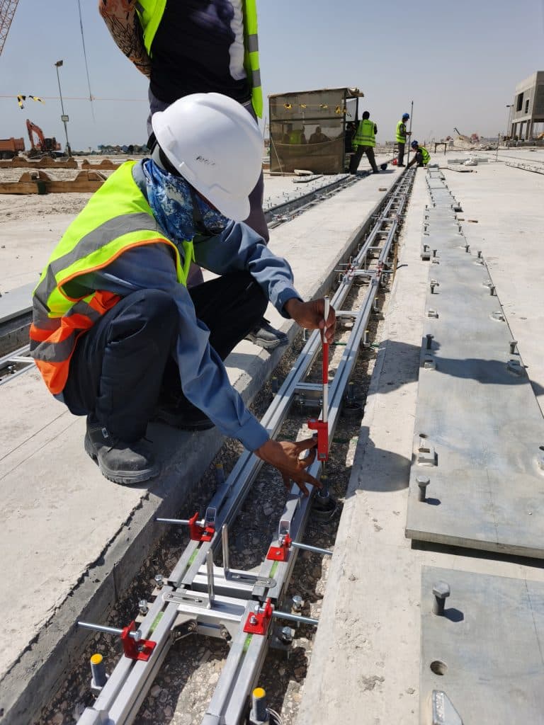 Field adjustment of sole plate height during heavy-duty crane rail installation construction
