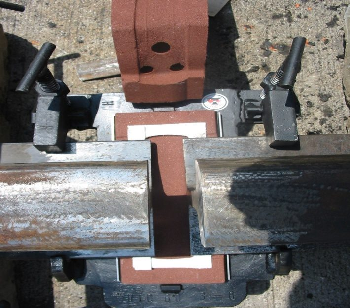 Alignment of a worn rail for thermite welding