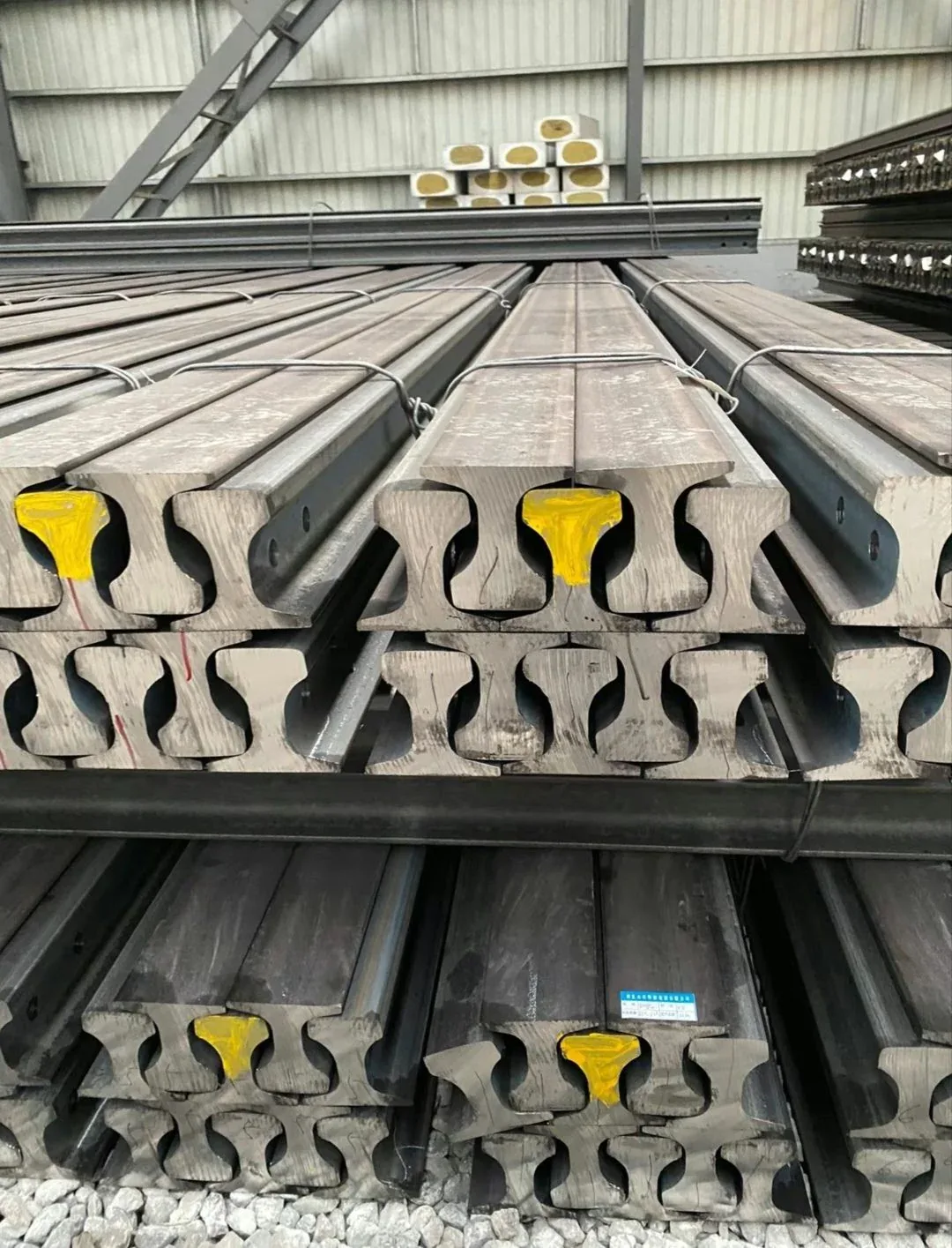 Heavy crane rail sections in the workshop